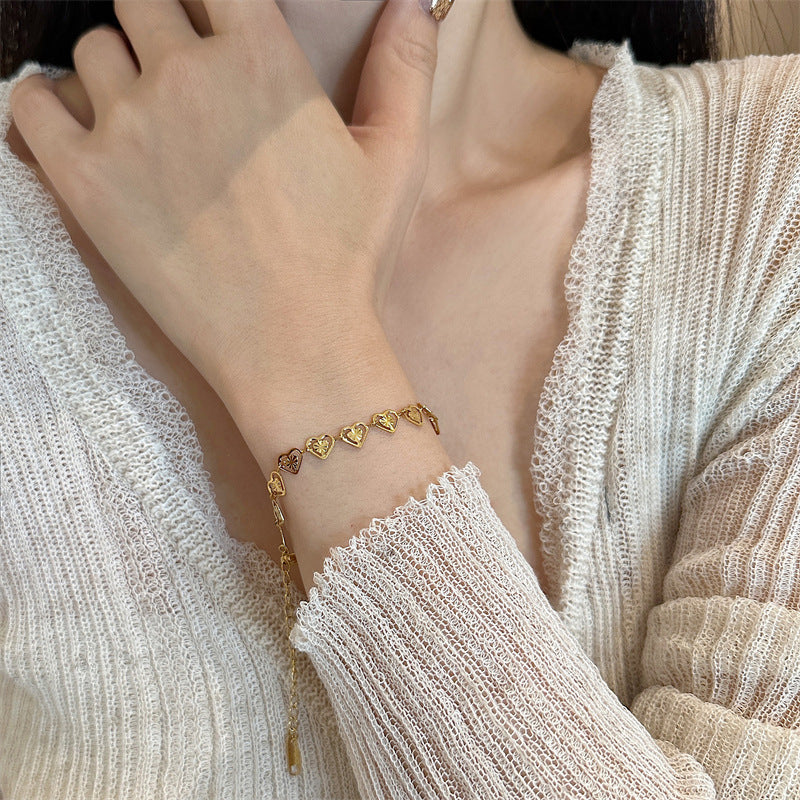 Gold jewelry worn as an everyday detail